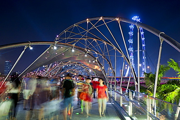 The Helix bridge at Marina Bay and Singapore Flyer, Singapore, Southeast Asia, Asia