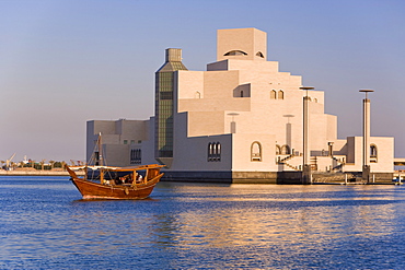 Dhow in front of the Museum of Islamic Art, designed by the renowned architect IM Pei, this museum has the largest collection of Islamic art in the world, Doha, Qatar, Middle East