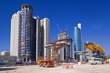 Skyscrapers and new constuction of the Dubai monorail line along Sheikh Zayed Road, Dubai, United Arab Emirates, Middle East