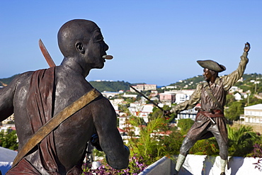 Sculpture in Blackbeard's Castle, one of four National Historic sites in the US Virgin Islands, with Charlotte Amalie in the background, St. Thomas, U.S. Virgin Islands, West Indies, Caribbean, Central America