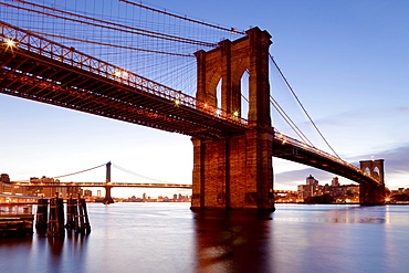 The Brooklyn Bridge spanning the East River between Brooklyn and Manhanttan, New York City, New York, United States of America, North America