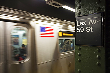 Subway station and train in motion, Manhattan, New York City, New York, United States of America, North America