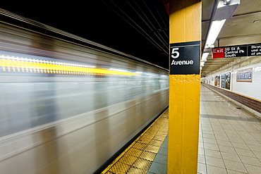 Subway station and train in motion, Manhattan, New York City, New York, United States of America, North America