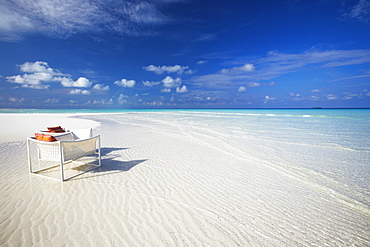 Deck chairs on tropical beach, Maldives, Indian Ocean, Asia