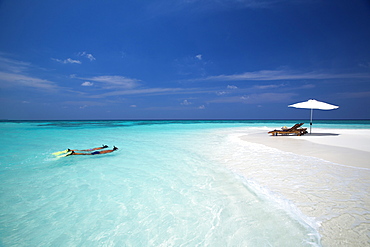 Couple snorkelling in Maldives, Indian Ocean, Asia