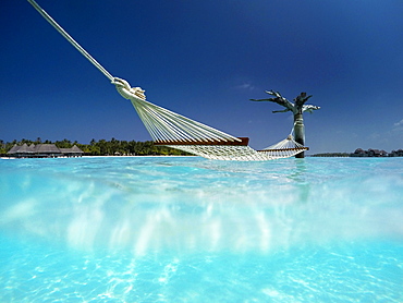 Hammock in the lagoon at Gili Lankanfushi Resort, Maldives, Indian Ocean, Asia