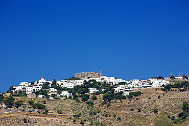 View of Chora town and Monastery of St. John the Evangelist, UNESCO World Heritage Site, Patmos Island, Greek Islands, Greece, Europe