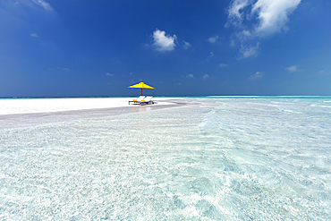 Two chairs and umbrella on stunning tropical beach,  The Maldives, Indian Ocean, Asia