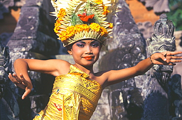 Legong dancer in action smiling, Bali, Indonesia, Southeast Asia, Asia