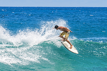 Surfing at Sunset Beach, North Shore, Oahu, Hawaii, United States of America, Pacific