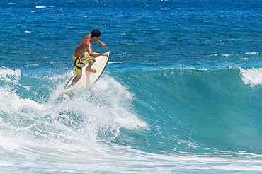 Surfing at Sunset Beach, North Shore, Oahu, Hawaii, United States of America, Pacific