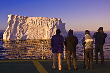 Passengers viewing iceberg in the Gerlache Strait, Antarctica, Polar Regions