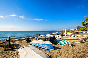 Fishing boats on Playa de la Cala beach, Estepona, Malaga, Costa del Sol, Andalusia, Spain, Europe