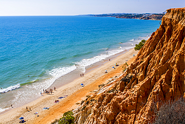 Red sandstone cliffs of Praia da Falésia, Albufeira district, souther, portugal