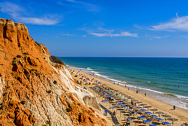 Red sandstone cliffs of Praia da Falésia, Albufeira district, souther, portugal