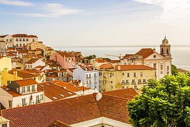 Skyline of Alfama district overlooking the Tagus River, Alfama district, Lisbon, Portugal.
