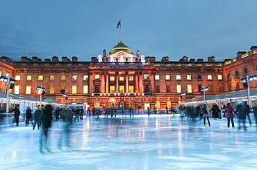 England, London, Skating on the seasonal ice rink at Somerset House.