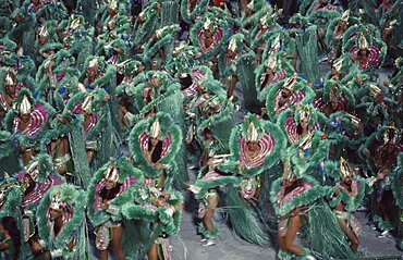 BRAZIL  Rio de Janeiro Carnival procession of dancers dressed in green feathered costumes Brasil