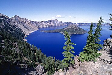 USA Oregon Crater Lake National Park View over water filled crater formed after the erruption of Mount Mazama with small island in the middle