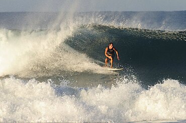 Mexico, Oaxaca, Puerto Escondido, Puerto Escondido Surfer in action.