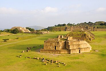 Mexico, Oaxaca, Monte Alban, Archaeological site Ruins of Monticulo J and Edifio I H and G buildings in the central plaza.