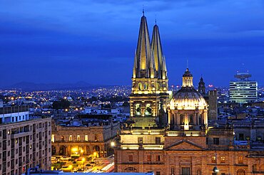 Mexico, Jalisco, Guadalajara, View of Cathedral and city at night.