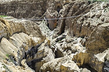 Nepal, Upper Mustang, Rope Bridge, The bridge across the deep canyon near Ghyakar village.