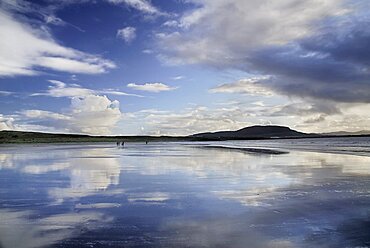 Ireland, County Sligo, Rosses Point, Beach with Knocknarea mountain in the distance.