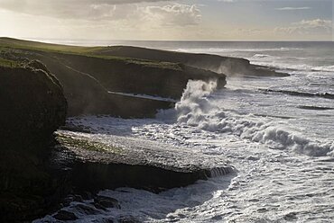 Ireland, County Sligo, Mullaghmore, High waves crashing against headland.