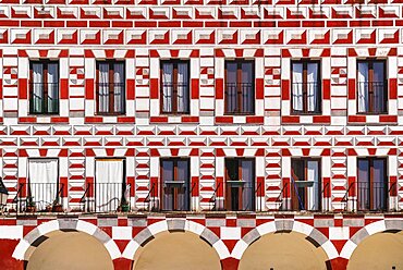 Spain, Extremadura, Badajoz, Colourfully painted exterior walls of building in Plaza Alta.