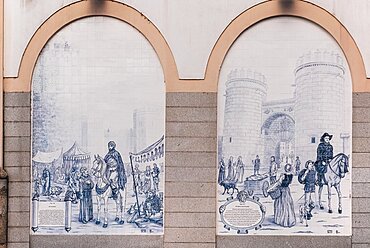 Spain, Extremadura, Badajoz, Tiled arches on building in Paseo de San Francisco showing Alcazaba and Puerta de Palmas.