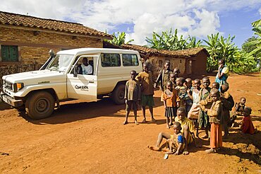 Rwanda, Children, Group of children on road beside a development project vehicle