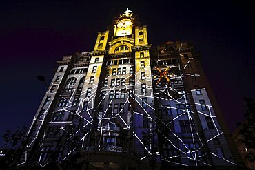 England, Merseyside, Liverpool, Royal Liver Building 100th anniversary constructed in 1911 celebrated by staging a 3D Macula light show with the theme Spider on Spiders Web.