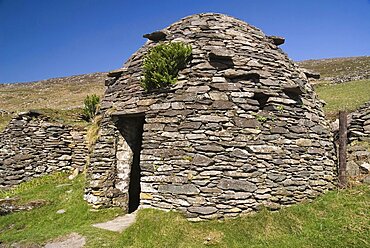 Ireland, County Kerry, Dingle Peninsula, Beehive hut in the Fahan Group.