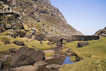 Ireland, County Kerry, Killarney, Gap of Dunloe with old stone bridge crossing mountain stream.