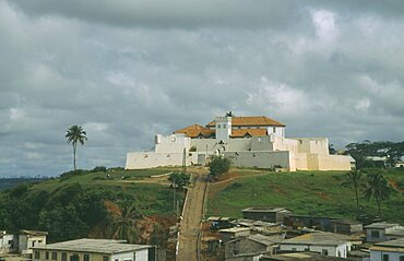 GHANA  Fort St Jago Elmina White hill fort with path leading up to the entrance.