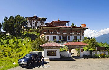 Bhutan, Zhemgang Dzong , Zhemgang Dzong with Police parked at entrance.