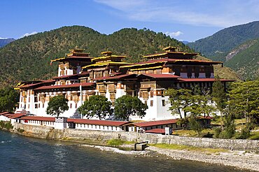 Bhutan, Punakha, Punakha Dzong, administrative centre of the region and former capital housing scared relics, beside the Mo Chhu river.