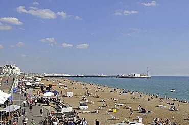 England, East Sussex, Brighton, View along the promenade and beach.