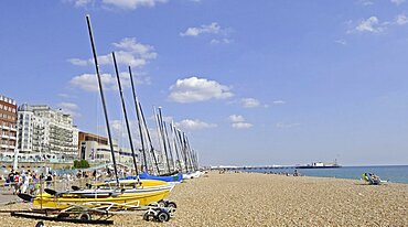 England, East Sussex, Brighton, View along the beach to Pier.