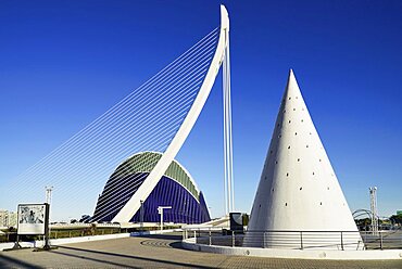 Spain, Valencia Province, Valencia, La Ciudad de las Artes y las Ciencias, City of Arts and Sciences,El Pont de l'Assut de l'Or Bridge and Agora with lift from Umbracle car park in foreground.,