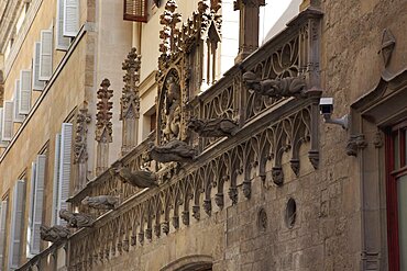 Spain, Catalonia, Barcelona, Gargoyles on a building in the Gothic District.