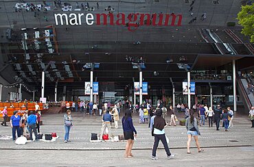 Spain, Catalonia, Barcelona, Mare Magnum mirrored glass modern shopping mall.