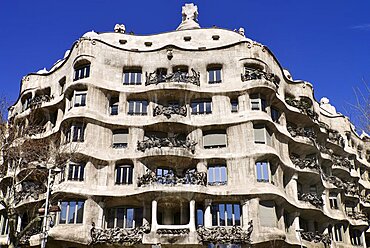 Spain, Catalunya, Barcelona, La Pedrera by Antoni Gaudi, a section of the building's facade.