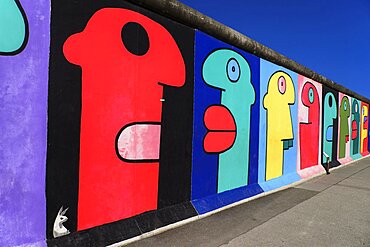 Germany, Berlin, The East Side Gallery, a 1.3 km long section of the Berlin Wall, Mural called Homage to the Young Generation by Thierry Noir.