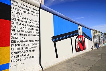 Germany, Berlin, The East Side Gallery, a 1.3 km long section of the Berlin Wall, A mural by Georg Lutz depicts former Soviet leader Mikhail Gorbachev driving.