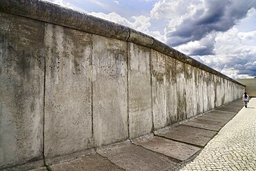 Germany, Berlin, Gedenkstatte Berliner Mauer also known as the Berlin Wall Memorial Exhibition at Bernauer Strasse, the memorial contains the last piece of Berlin Wall that has the preserved grounds of the border strip displayed behind it.