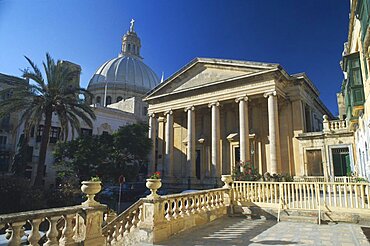 MALTA  Mdina St Pauls Anglican Catherdral with dome of Carmelite Church behind.