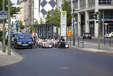 Germany, Berlin, Mitte, Tour of city in minature drag racing cars.