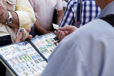 Spain, Madrid, Stamp collectors in the Plaza Mayor.